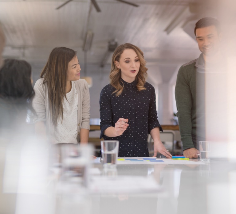 A group of people in a meeting