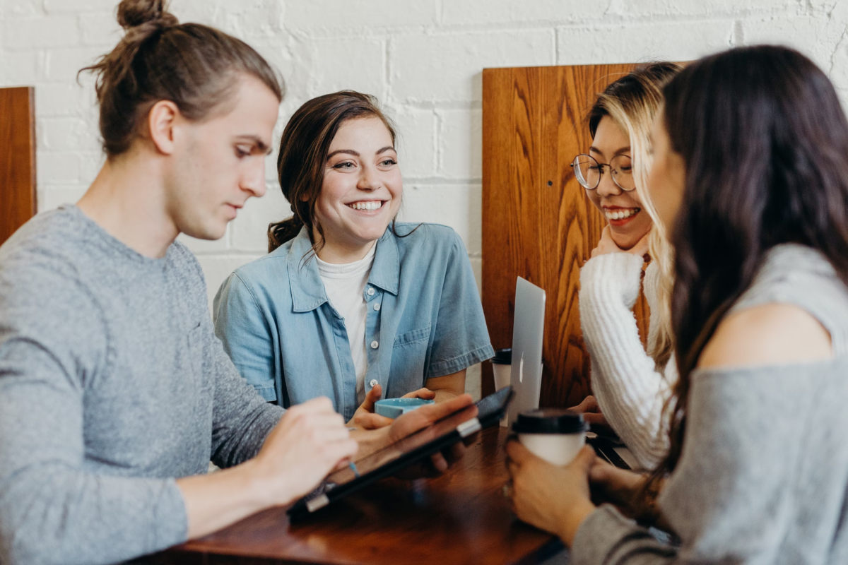People smiling and discussing