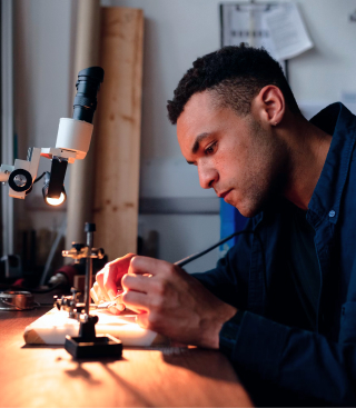 A man working on aerospace parts.
