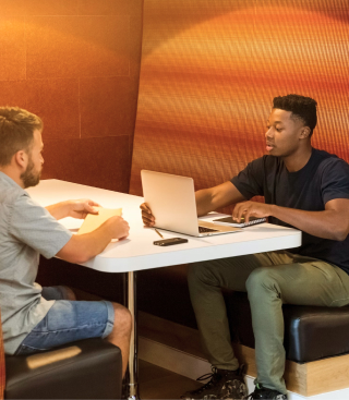 Two men discussing ideas