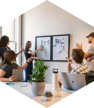 A group of people discussing plans